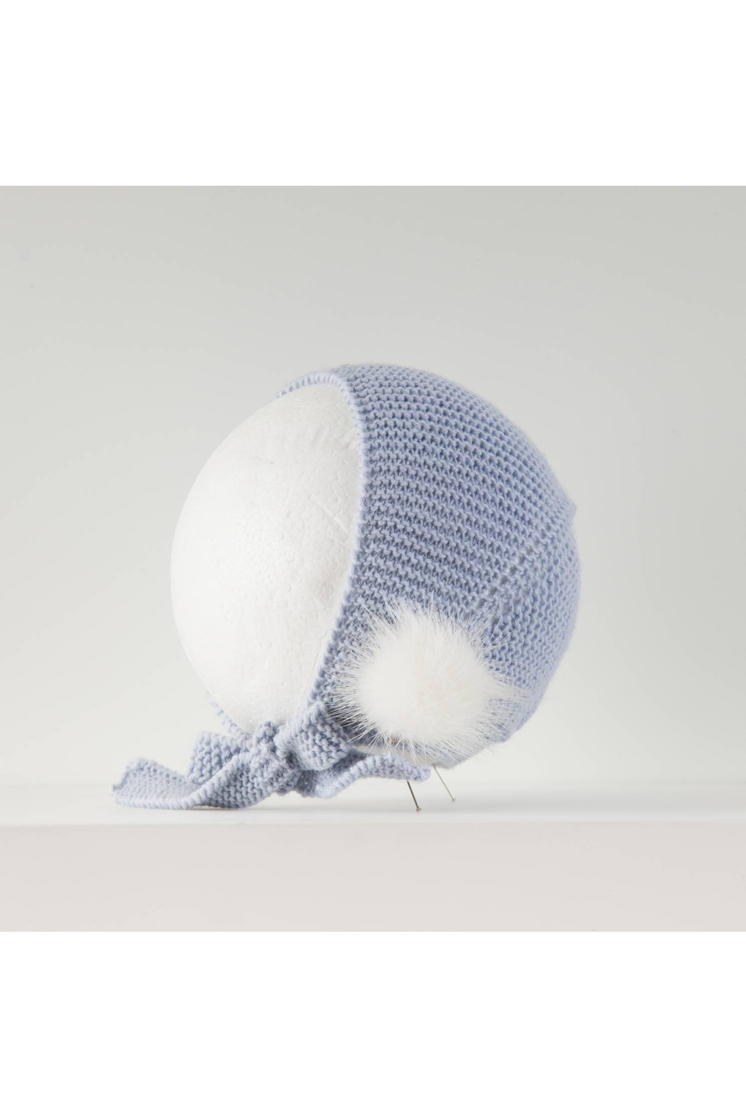 capota canastilla lazada punto merino celeste pompon vison