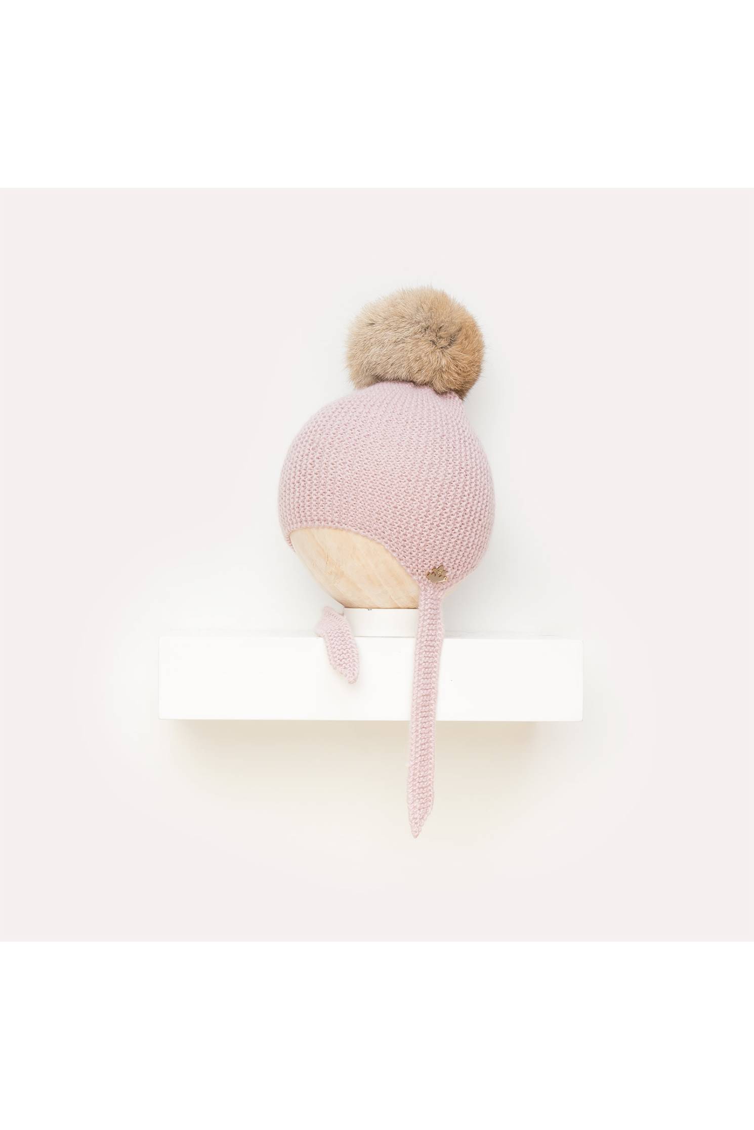 gorro aviador merino elast rosa empolv con pompon rapado