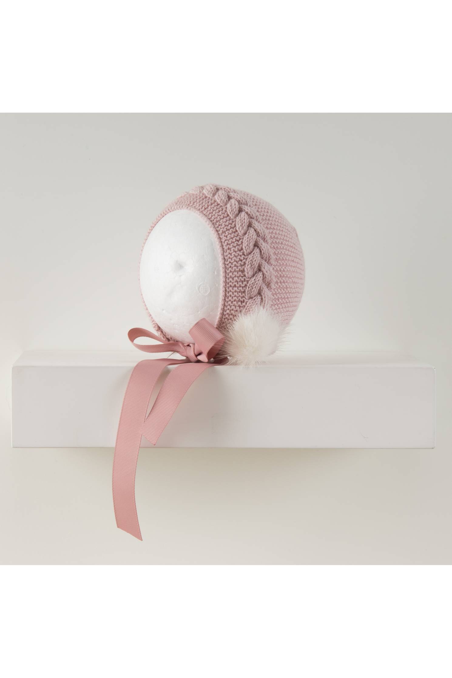 capota merino trenza rosa empolv pompon vison